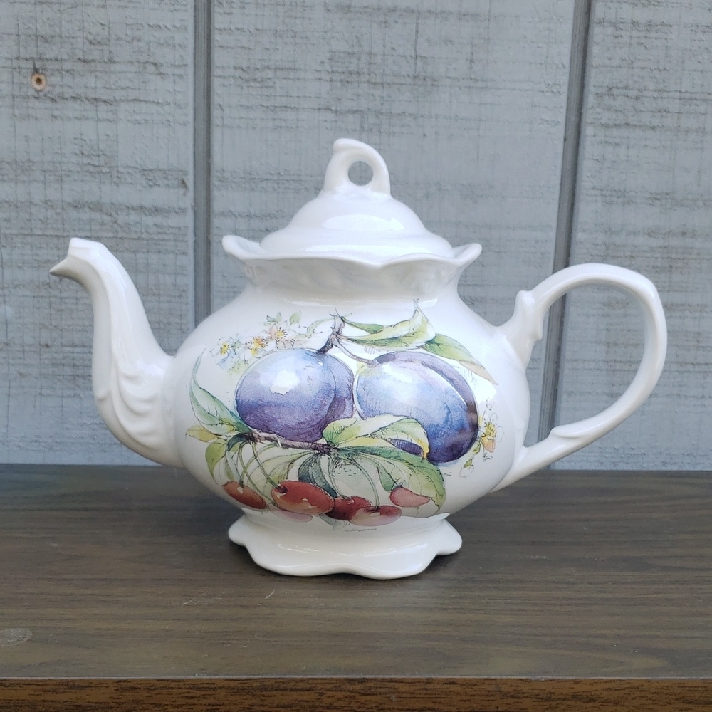 Elegant White Ceramic Teapot with Fruit Design